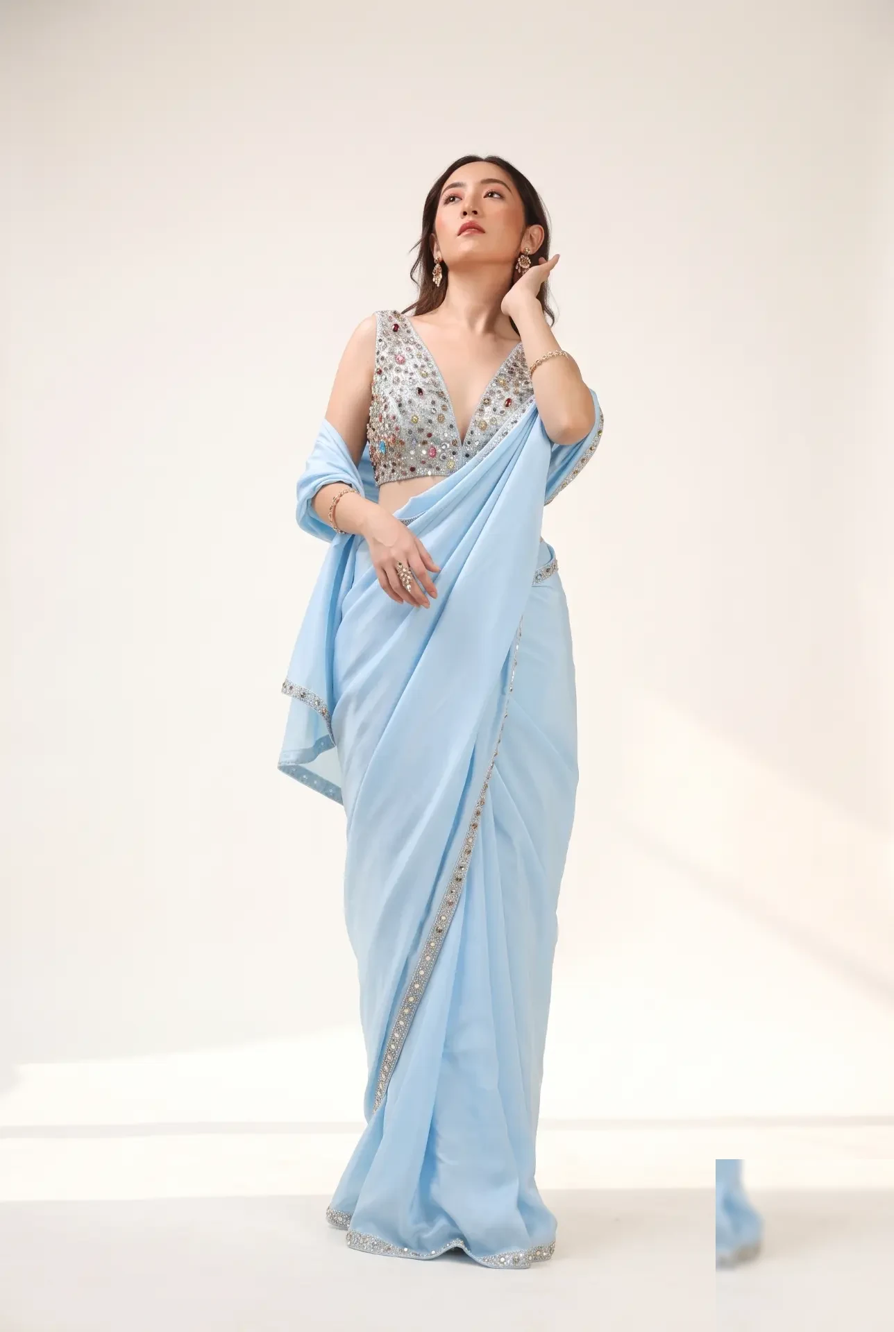 Neelam Stone Saree — Pure silk saree with stone-studded blouse